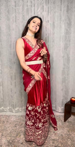 Style me subtle in our Reyna Glazed Classy Pleated Gown Saree with Gara Palla and Belt - Red